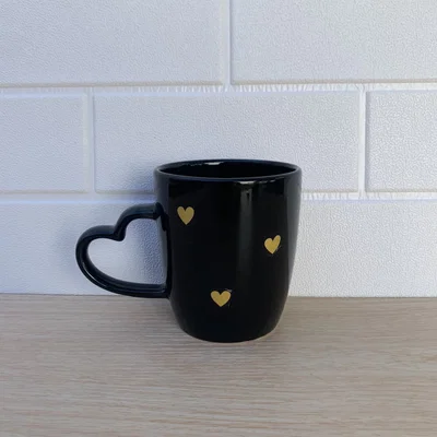 Taza cerámica asa corazón negra 