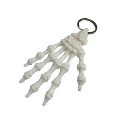 LLAVERO HUESO MANO ARTICULADA