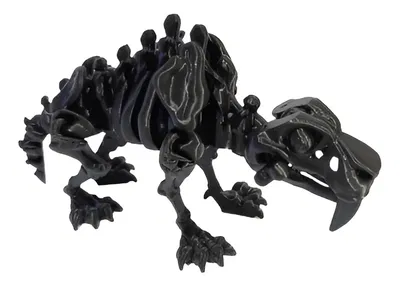 DIENTES DE SABLE ESQUELETO ARTICULADO CON HUESO