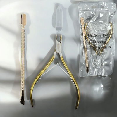 CORTA CUTICULAS CON REPUJADOR CHARM LIMIT