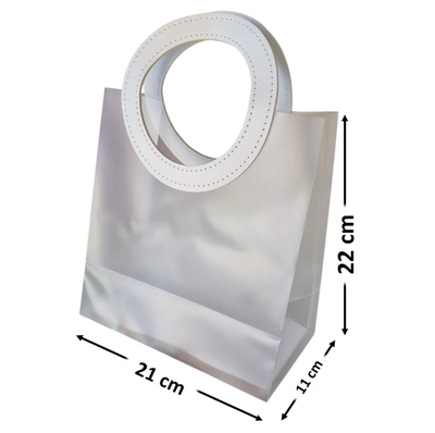 Bolsita GRANDE transparente esmerilada con manija de cuerina 22x21x11 x1 unidad