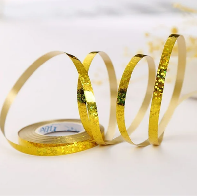 Cinta ribbon para globos DORADA HOLOGRAMADA 10mts. x1 unidad