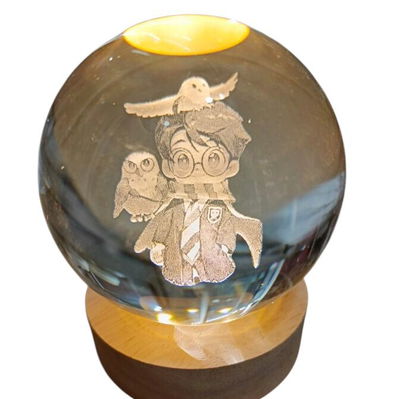 Bola cristal GIRATORIA CHICO LED HARRY POTTER con base de madera modelos surtidos 