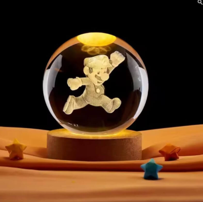 Bola cristal GIRATORIA CHICO LED MARIO BROS con base de madera modelos surtidos 