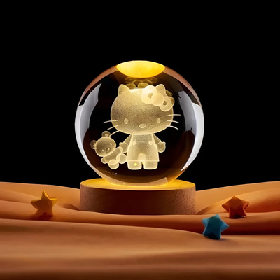 Bola cristal GIRATORIA CHICO LED KITTY con base de madera modelos surtidos 