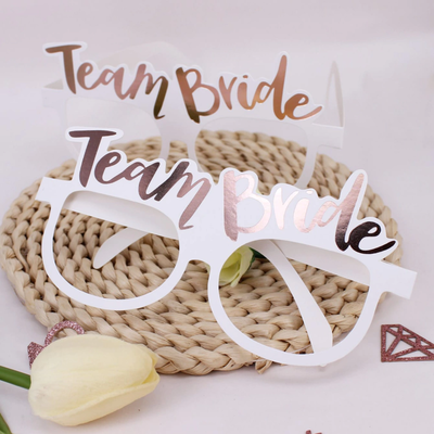 Anteojos de cartón "Team Bride" BLANCO Y ROSA GOLD x10 u. ideal para despedida de soltera