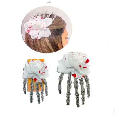 Hebilla clip mano esqueleto con flor sangrienta halloween x1 unidad