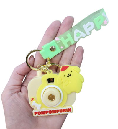 Llavero cámara proyector MINI POMPOMPURIN