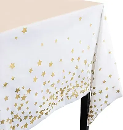 Mantel plástico metalizado BLANCO con estrellitas DORADAS 1,37x 2.74m