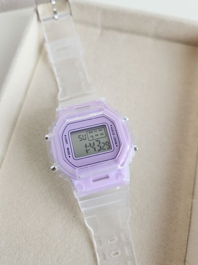 RELOJ CHECA LILA