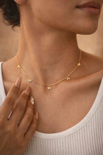 Collar Moños Dorado