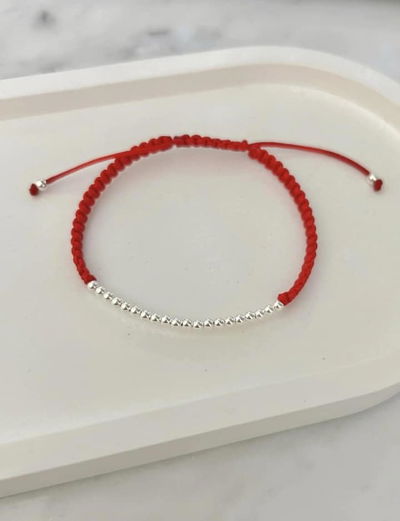 Pulsera hilo bolitas 