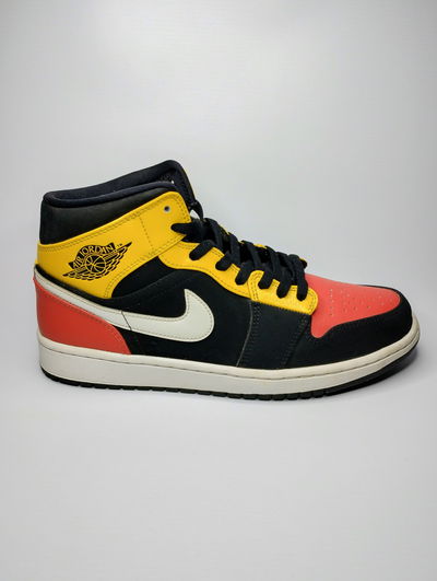 NIKE AIR JORDAN 1 MID BLACK AMARILLO ORANGE