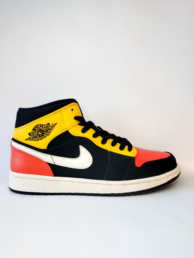 NIKE AIR JORDAN 1 MID BLACK AMARILLO ORANGE