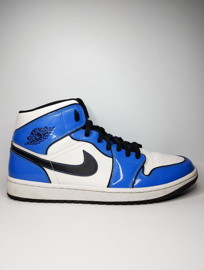 NIKE AIR JORDAN 1 MID SIGNAL BLUE