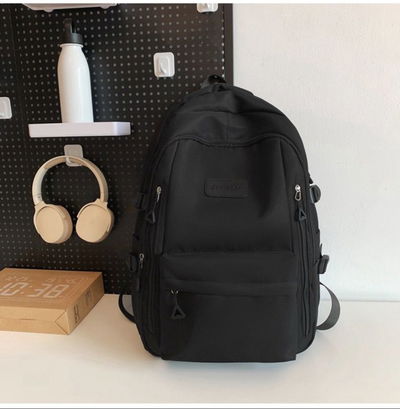 Mochila importada con llavero negra 