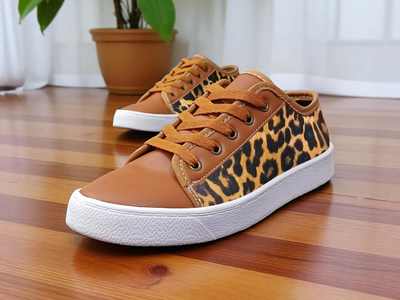 Zapatillas ANIMAL PRINT Y CUERO PU SUELA