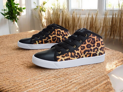 BOTITAS ANIMAL PRINT CON CUERO P.U. NEGRO