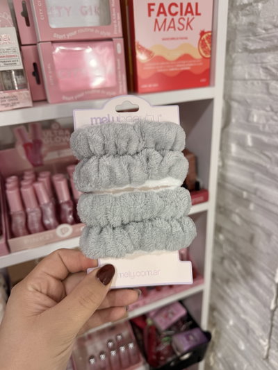 Muñequeras de peluche gris