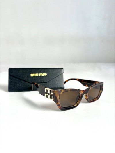 Lentes MiuMiu leopardo 