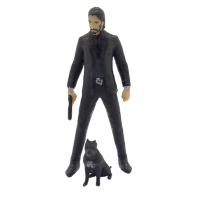 John Wick con arma y perro