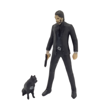 John Wick con arma y perro
