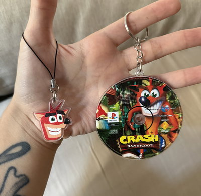 Llavero disco Crash Bandicoot y Phonecharm Crash