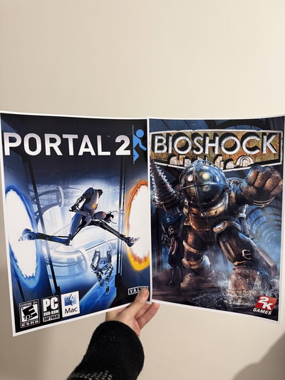 Poster portal 2 y Bioshock