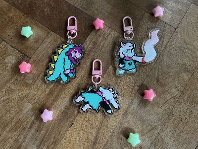 Llaveros deltarune (Susie y Ralsei)