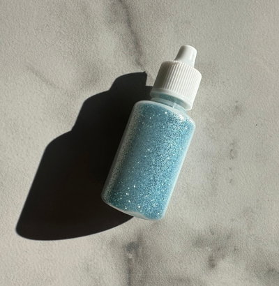 glitter en gotero celeste