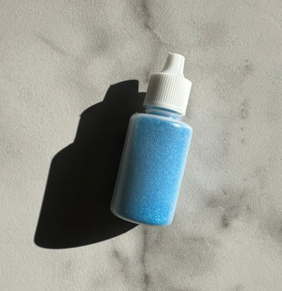 glitter en gotero azul