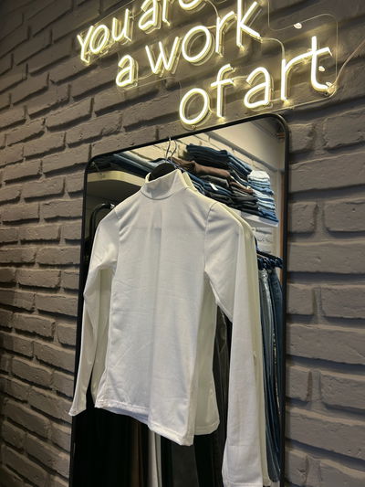 Manga larga media polera