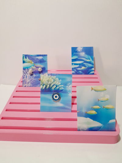 Exhibidor / organizador de postales, pendientes y stickers