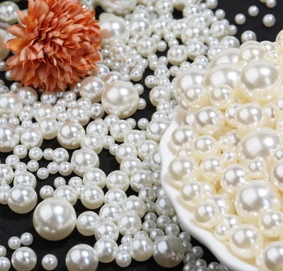 Perlas plásticas perladas naturales x 50g