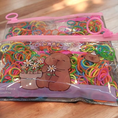 400 loom bands con estuche, aguja y ganchitos