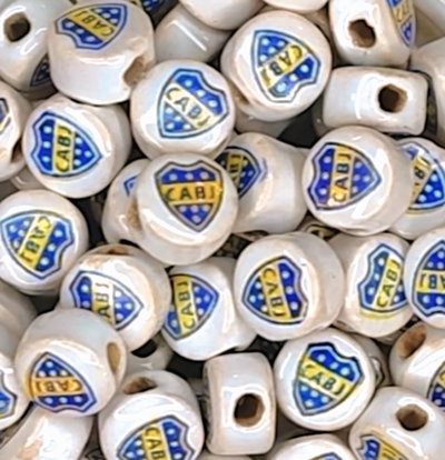 Dije boca cerámica x unidad