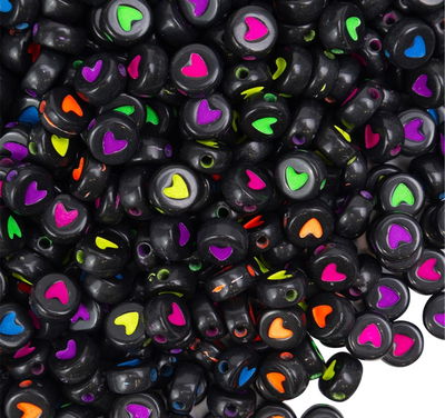 400u aprox corazones fluo y negro (50g)