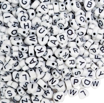 400u aprox letras corazón blancas (50g)