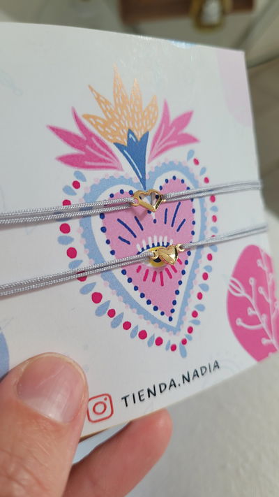 Pack de pulseras corazones dorados