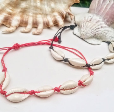 Pulsera/tobillera de caracoles con hilo 