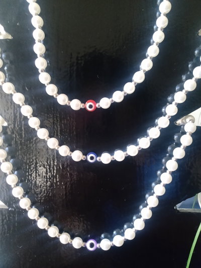 Collar de perlas con ojos turcos