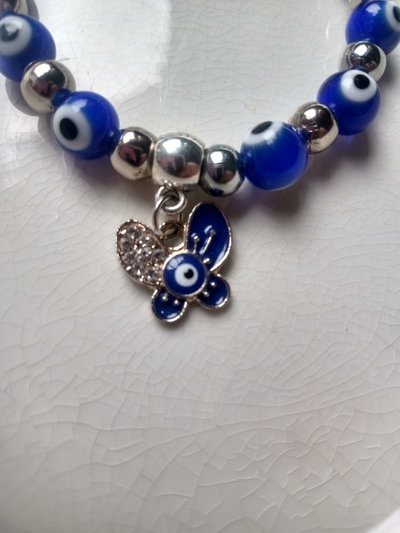 Pulsera mariposa  ojo turco azul con ojos turcos azul