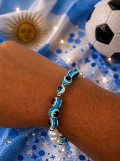 Pulsera Amuleto de argentina  con ojos turcos celestes 