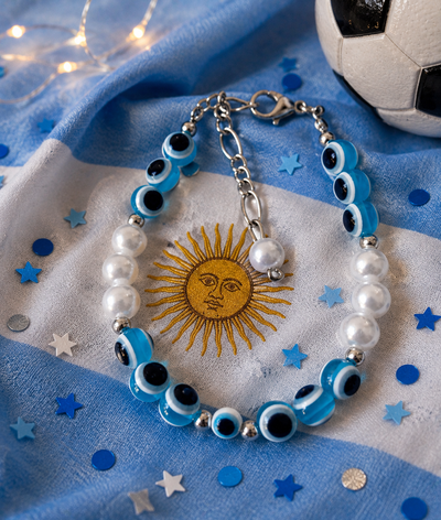 Pulsera Amuleto de argentina  con ojos turcos celestes 