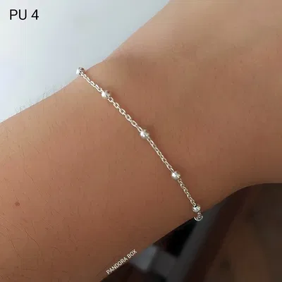 Pulsera forzada con bolitas