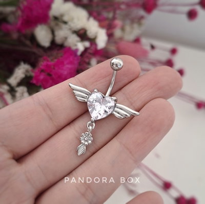 Piercing omb. Corazón alitas