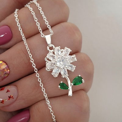 Collar flor giratorio - Ac. blanco 