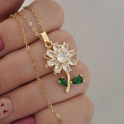 Collar flor giratorio - Dorado 