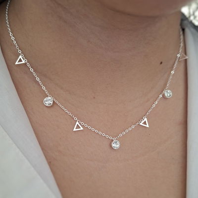 Collar dijes trian - Ac. blanco