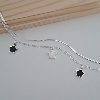 Pulsera doble estrella esmaltada - Ac. Blanco